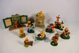 Disney - A collection of Winnie The Pooh themed figures / groups to include Classic Pooh from