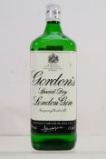 A 1 litre bottle of Gordon's Special Dry London Gin, 37.5 abv.