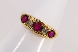 A yellow metal diamond and ruby ring, size approximately Q but shank misshapen, 2.