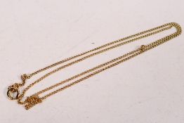 A yellow metal (stamped 9ct) fine trace chain (A/F), approximately 1.8 grams.