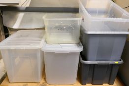Six various sized plastic storage boxes.