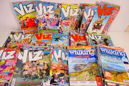 Two boxes of Viz adult humour comics and Country Walking magazine. [2].