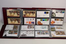 A collection of Great Britain First Day Covers covering 1996 to 2011 contained in four Royal Mail