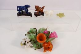 A collection of Chinese jade or similar hardstone figures to include a turtle with smaller turtle