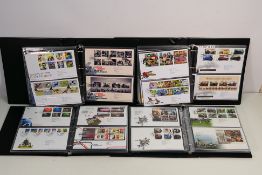 A collection of Great Britain First Day Covers covering 2011 to 2026 contained in four Royal Mail