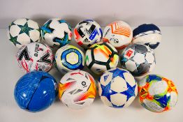 Thirteen miniature replica footballs to