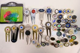 A collection of UK and foreign golf club ball markers,