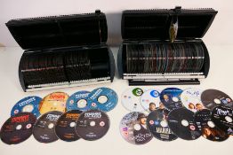A Discgear Selector 100 DVD organiser and a similar MediaRange example containing a large quantity