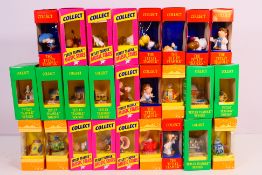 A quantity of boxed Tetley Teafolk figures and models, approximately 26 in total.