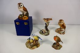 Royal Crown Derby - Five avian studies comprising two Owl figures,