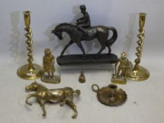 A collection of brassware to include a pair of candlesticks, chamber stick,