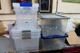 Six various sized plastic storage boxes. [6].