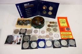 A collection of coins to include commemorative crowns, USA 1964 Half Dollar,