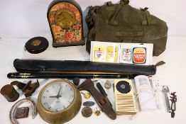 A mixed lot to include clocks, a cased Marlin pool cue,