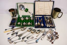 A collection of plated ware to include tankards and flatware, part boxed / cased.