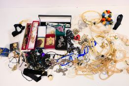 A collection of costume jewellery to include necklaces, earrings, rings and similar.