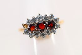 A 9ct yellow gold stone set ring, size R, approximately 2 grams.