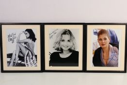 James Bond 007 - Three photographic images of Bond girls bearing signatures comprising Martine