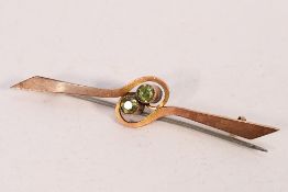 A rose metal (stamped 9ct) stone set bar