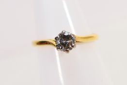 An 18ct yellow gold diamond solitaire ring with a stone of approximately 20 pts, size M,