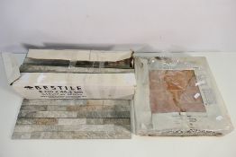 Lot to include a box of nine floor tiles measuring 33 cm x 33 cm and a box of Spanish tiles,