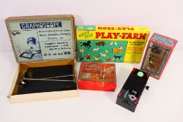 Yone - Spears Games - Louis Marx - A group of mid century toys, a boxed Yone wind up Coffin Bank,