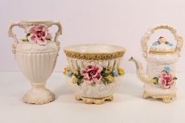 Three pieces of Capodimonte with applied floral decoration.