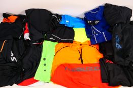 A collection of sportswear to include a Sub Sports men's cycle bib and shorts in UK M size with