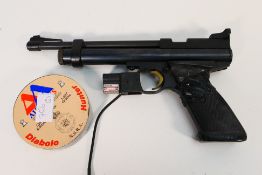 A Crossman 2240 CO2 0.22 air pistol.