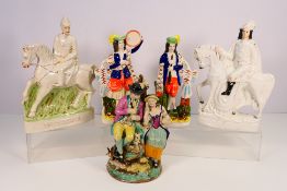 A collection of Staffordshire type figures / groups including a group after Ralph Wood emblematic