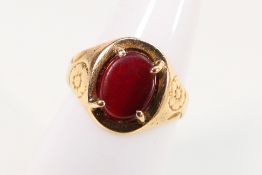 A 9ct yellow gold stone set signet ring, of London assay, size N, approximately 3.5 grams.