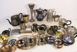 A collection of plated and pewter wares.