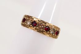 A 9ct gold stone set ring, size L, approximately 2 grams.