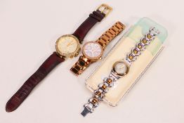 Three wristwatches to include Michael Kors and Swatch Irony.
