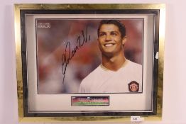 A signed photographic image display depicting Cristiano Ronaldo,