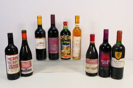 Nine bottles of wine, including a Sauternes, a 2002 Villa Icona and others.