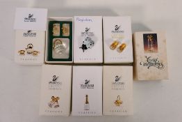 Seven boxed Swarovski Crystal Memories pieces to include Ladybird, Flower Basket, Champagne Bottle,