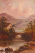 A framed oil on canvas landscape scene with a bridge over a river before a mountainous backdrop,