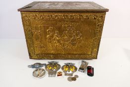 A vintage brass clad coal box with embossed decoration and a quantity of small collectibles to