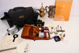 A mixed lot to include travel grooming kit, camera equipment, plated and brass ware,