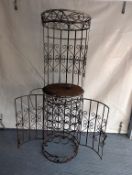 A vintage 20th century Spanish illuminated wrought iron bar with fitted wine rack and wine glass