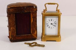A late 19th century French brass, small carriage timepiece,