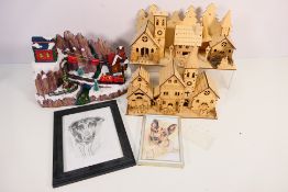 Three illuminated / musical Christmas decorations and two framed drawing of dogs.