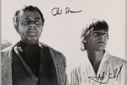 Star Wars - A signed black and white photographic image from A New Hope depicting Luke Skywalker