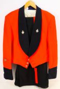 A British Army mess dress uniform bearing insignia comprising jacket, waistcoat and trousers.