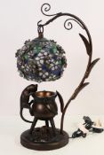 A boxed table lamp with decorative Tiffa