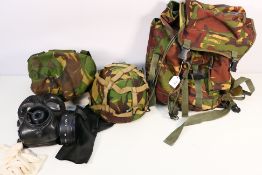 A Highlander Ben Nevis 33 litre camouflage rucksack containing a Mk 6 Combat Helmet with liner and