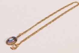 A 9ct yellow gold necklace with yellow metal mounted opalescent cabochon, 46 cm (l),