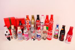 A collection of special edition Coca-Cola,