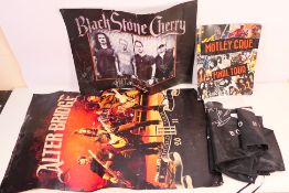 A collection of posters, tour programme and similar relating to bands including Motley Crue,
